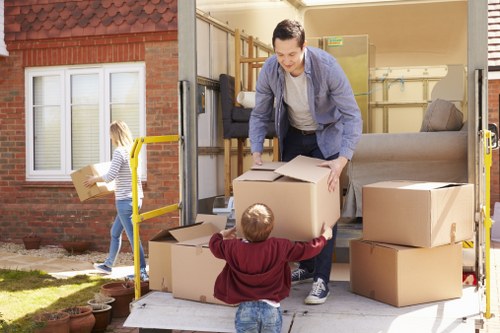 House removals team planning a move in Hackney street
