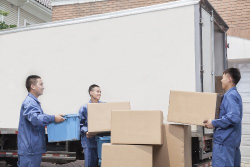 Removal team preparing boxes and furniture for a Hackney move