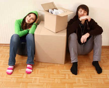 Packers preparing boxes for a move in Hackney