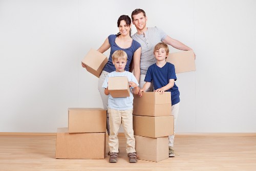 Boxes and furniture arranged during a local Hackney home move