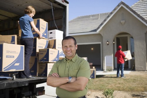 Boxes and household items prepared for transport by a local van service