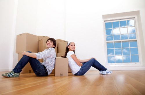 Removal team estimating space for a Hackney move using volume-based pricing