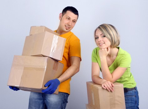 Professional movers handling boxes in Hackney