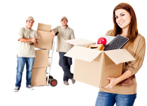 Packed boxes and furniture prepared for a house move in Hackney