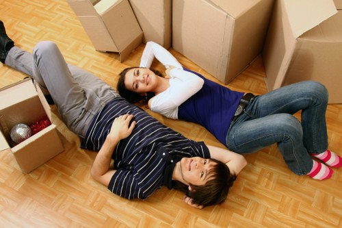 Customer booking a removals service with paperwork and checklist