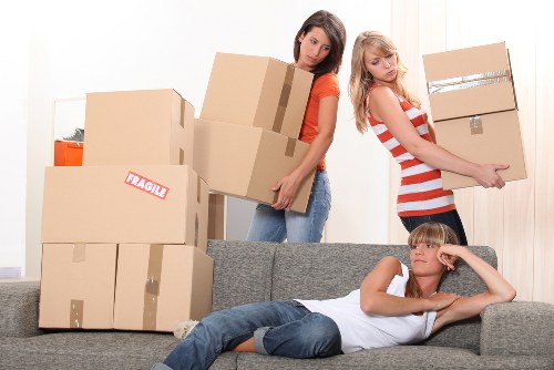 Apartment moving scene in Hackney with stairs and packed items